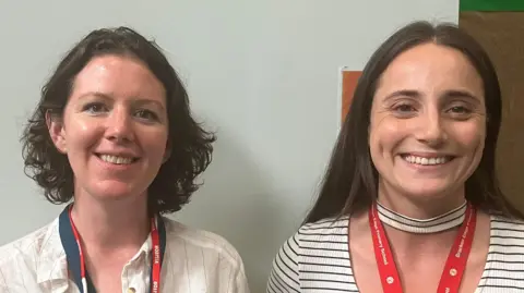 Catherine Hayward, a woman with mid-length brown curly hair, and Amy Potter, a woman with long brown hair and a stripey top