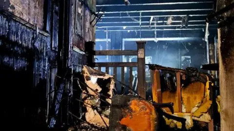 South Yorkshire Fire Service Gutted interior of pub