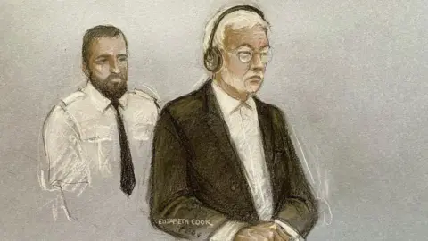 PA Media Hongchi Xiao sketched in court with grey hair, glasses and a beard in a suit. A security guard with a black tie and white shirt is stood behind him.