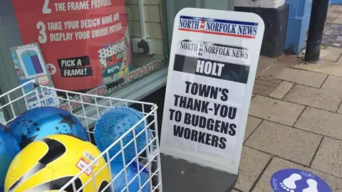 Newspaper bill outside newsagent