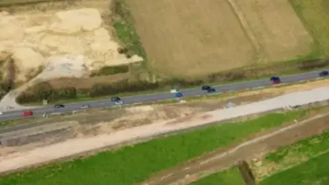 Traffic on the section of the A303 which is being upgraded, with roadworks to widen the road underway