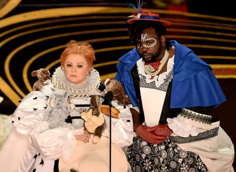 AFP Melissa McCarthy and Brian Tyree Henry