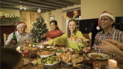 Getty Images Family Christmas dinner