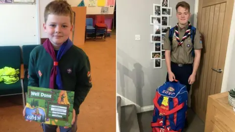 Supplied A side-by-side image of Jack Robinson as a child and a teenager. He is wearing scouts uniform in both photos. In the first one, he is a member of the Cubs group and is holding a green certificate reading Well Done. In the second one he is standing at the bottom of the stairs and holding a blue back pack with his name on it. He has short straight brown hair and brown eyes.