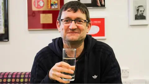 Emma Farrer Paul Heaton with a drink