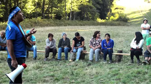 Goldman Environmental Prize Mr Curamil addresses members of the Mapuche community ahead of a march