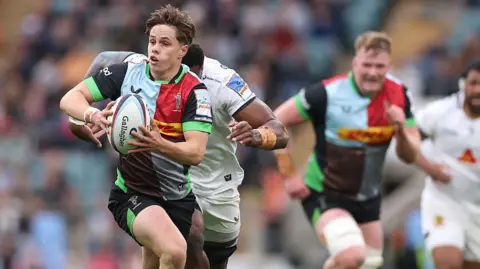 Lucas Friday of Harlequins runs with ball in hand