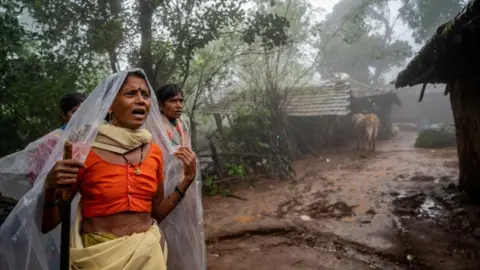 Getty Images Ragi Pardhi, 45, whose 14 relatives died in the landslide at Irshalwadi village, Khalapur in Raigad.