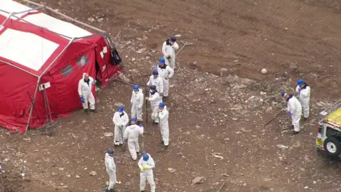 Police searching landfill site in Bury