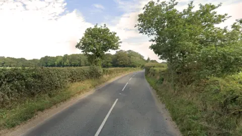 Google The B1110 at North Elmham, a single carriageway rural road