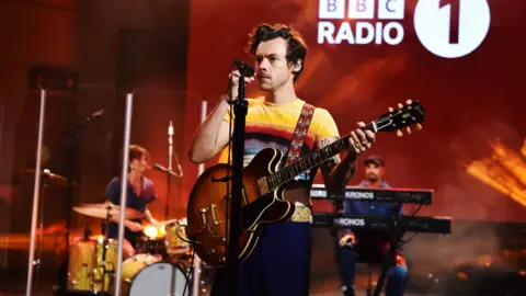 Harry Styles performing at the Radio 1 Live Lounge.