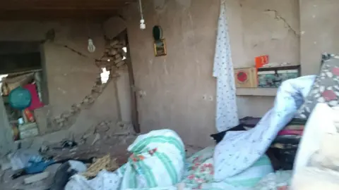 Khosrow Home destroyed by Iran earthquake