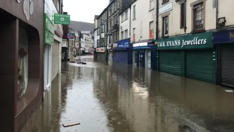 BBC Pontypridd's Taff Street during flooding, with water covering the entire street