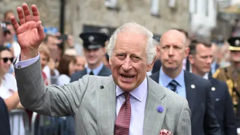 Finnbarr Webster/PA Wire King Charles III meets members of the public during a visit to St Ives Harbour, Cornwall, to meet members of the Cornish community. Picture date: Thursday July 13, 2023
