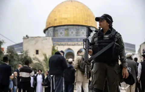 Getty Images Israeli police outside the Dome of the Rock in Jerusalem, April 11, 2023