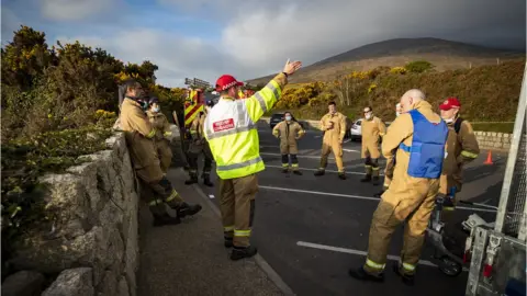 Pacemaker Fire crews were briefed on Sunday morning before returning to the mountain