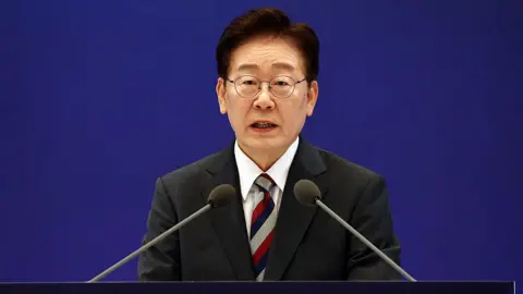 South Korean President Lee Jae-myung speaking during a news conference at the presidential Blue House in Seoul