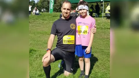 Steve Bladon Steve Bladon pictured with his son Noel after a running event in Norwich