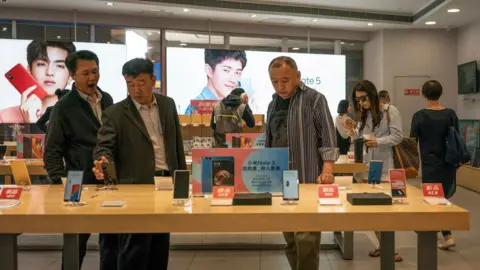 Getty Images A phone store in China