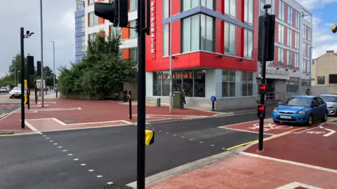 Daniel Mumby A picture of a crossing in a road