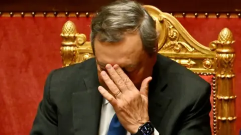 Getty Images Italy's Prime Minister Mario Draghi reacts during the debate on government crisis on 20 July