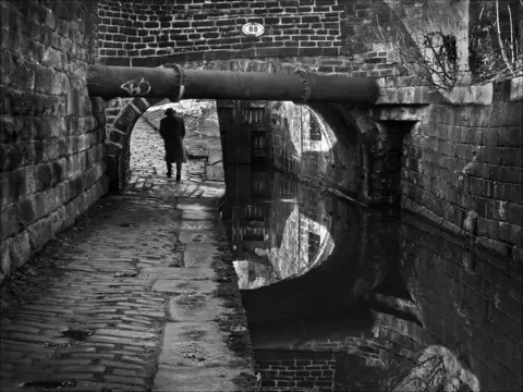 Irina Wright Figure by the canal