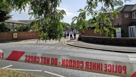 PA Media Police cordon in Southall