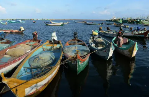 Getty Images Representational image: Indian fishermen arrive at a harbour after a night working at sea in Chennai