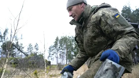 Reuters Ukrainian soldier near Makariv