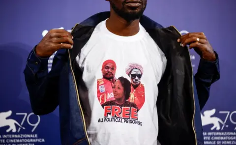 Reuters Bobi Wine wearing a T-shirt which says Free All Political Prisoners