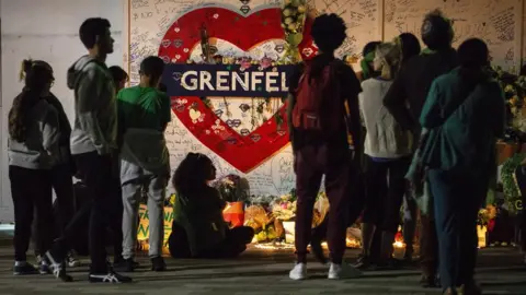 EPA A vigil at Grenfell Tower to mark one-year anniversary