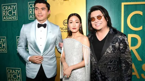 Getty Images Henry Golding, Constance Wu and Kevin Kwan