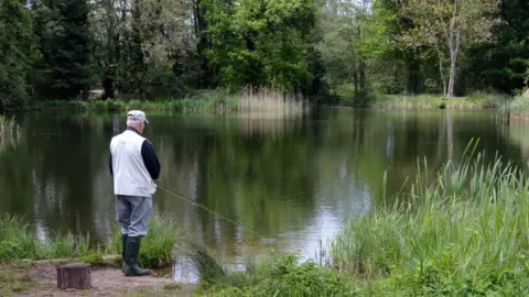 Getty Images Trout fishing