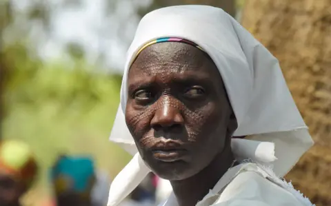 Getty Images The face of a woman with tribal tattoos on her face