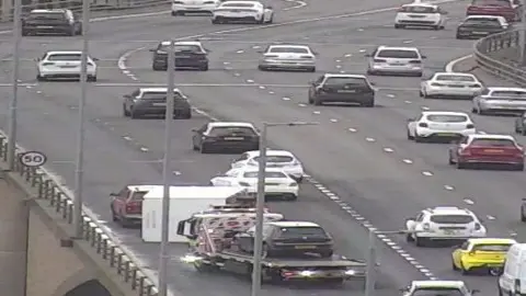 Traffic Scotland CCTV still showing an overturned trailer on the Kingston Bridge in Glasgow