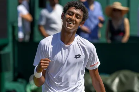 Getty Images Arnav Paparkar of India celebrates his victory during his match against Ryo Tabata of Japan (not pictured) in the third round of the Boys' Singles Competition at the Wimbledon Lawn Tennis Championships on 8 July, 2026, in London, England. 