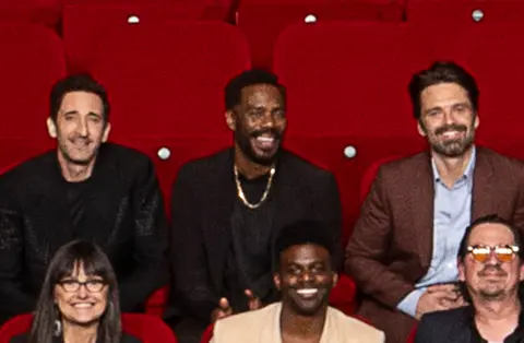 AMPAS Adrien Brody, Colman Domingo and Sebastian Stan in the 97th Oscars nominees dinner class photo