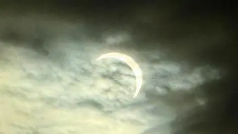BBC Weather Watchers/Anne's World solar eclipse partially covered by clouds 