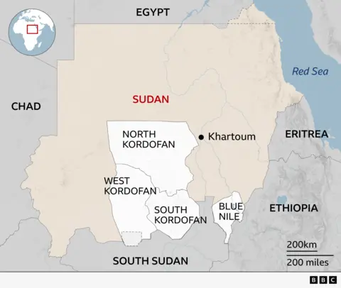 A regional map of Sudan highlighting four central and southern states: North Kordofan, West Kordofan, South Kordofan and Blue Nile. Khartoum is marked with a black dot to the east of North Kordofan. Surrounding countries include Egypt to the north, Chad to the west, South Sudan to the south and Eritrea and Ethiopia to the east, with the Red Sea shown on Sudan’s north-eastern coast. An inset globe indicates Sudan’s position in the north east of Africa.