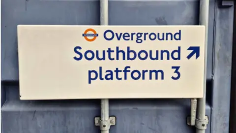 London Transport Museum A London Overground sign saying southbound platform three with an arrow pointing towards the top right