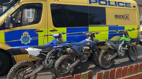 Merseyside Police Scrambler bike seized by police in front of police van