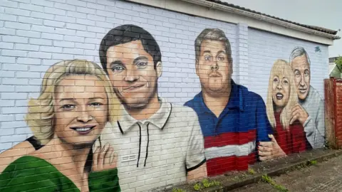 Tee2Sugars Painted mural showing Gavin, Stacey, Pam, Mick and Smithy. 