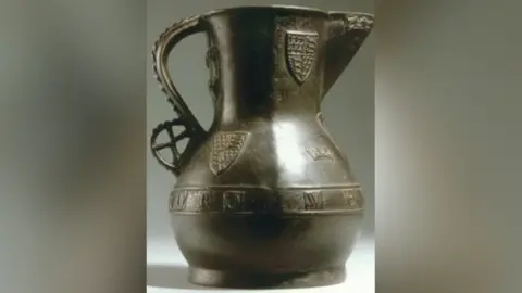 The Wenlok Jug is a bronze jug with two coat of arms on the design.