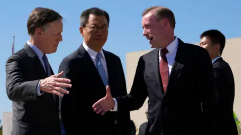 Getty Images US National Security Advisor Jake Sullivan (R) is welcomed by Director General of the Department of North American and Oceanian Affairs of the Foreign Ministry Yang Tao (C) and US Ambassador to China Nicholas Burns (L) upon arriving at the Beijing Capital International Airport in Beijing on August 27, 2024.