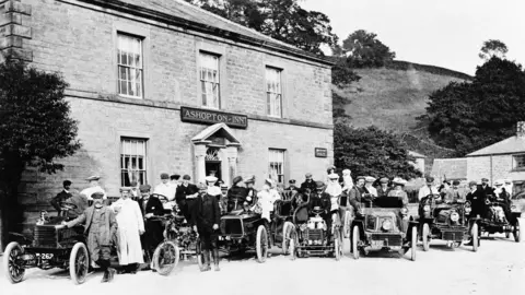 Getty Images Sheffield Automobile Club outside the Ashopton Inn, Derwent, Derbyshire in 1904, now submerged under the Ladybower Reservoir