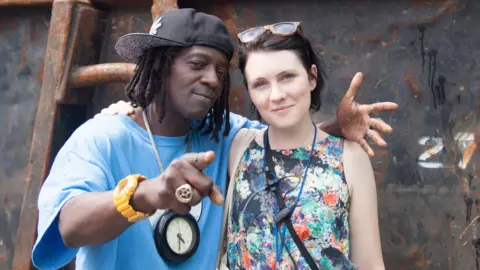 Simon Butler Flavor Flav and Sarah Nulty (right)