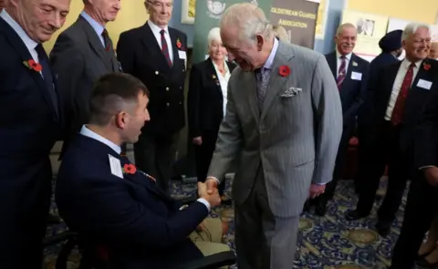 Reuters/Pool King Charles meets Ben Parkinson in Doncaster