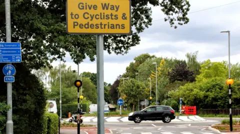 Getty Images Dutch style roundabout with give way sign prioritising cyclists and walkers