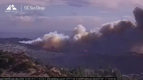 Smoke billows across LA skyline