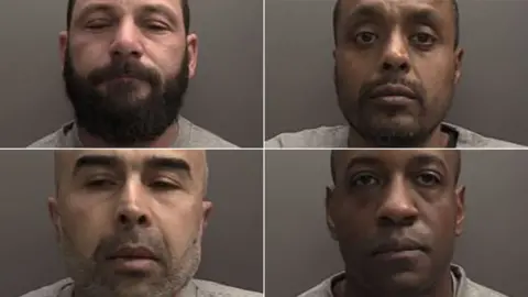A composite image showing police custody shots of four men, all with serious expressions, in front of a dark-grey backdrop. They are wearing light-grey T-shirts. One has a full, dark-brown beard. Two have stubble. One is clean shaven.